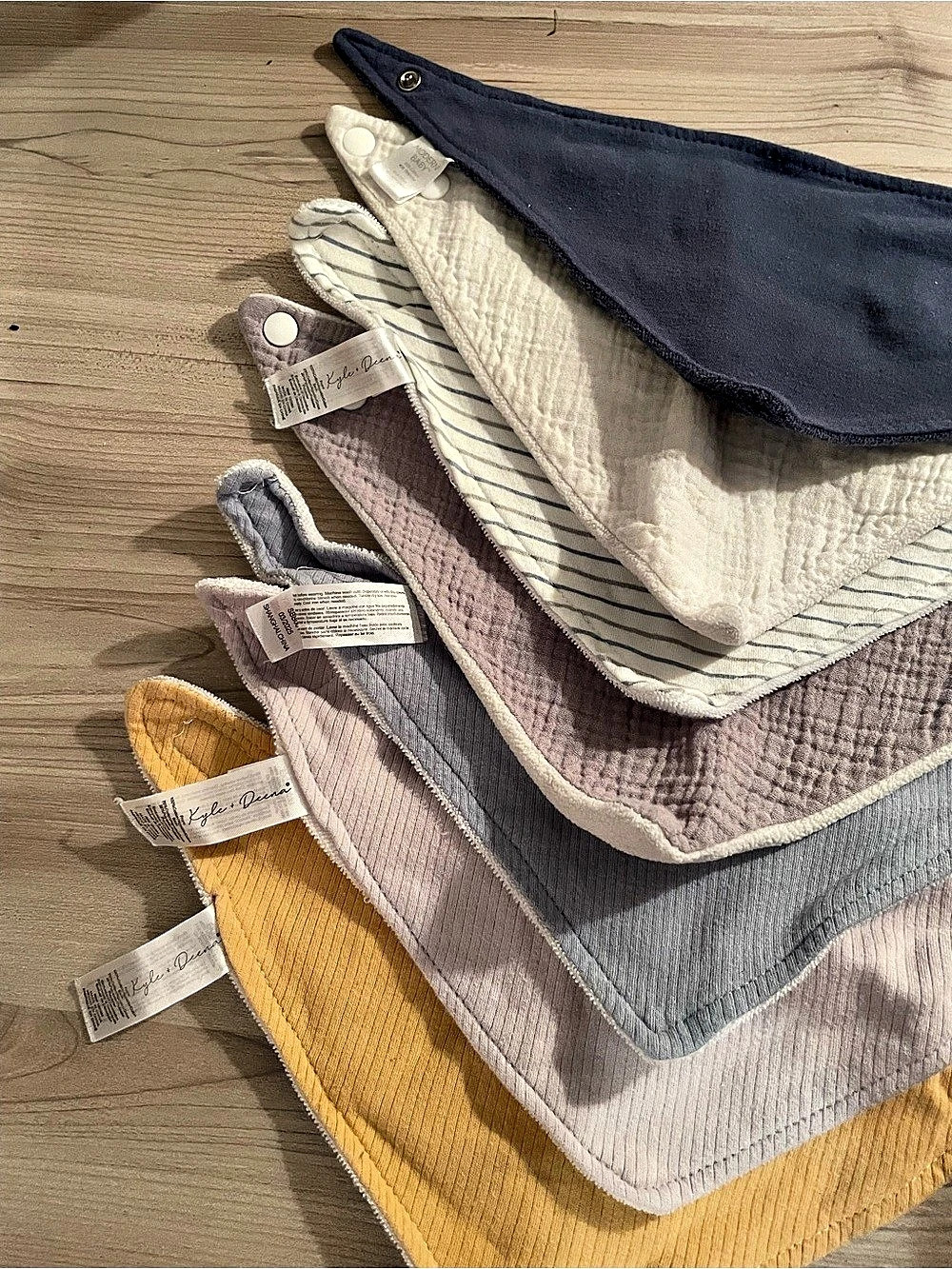 Bundle of baby cotton bibs and socks